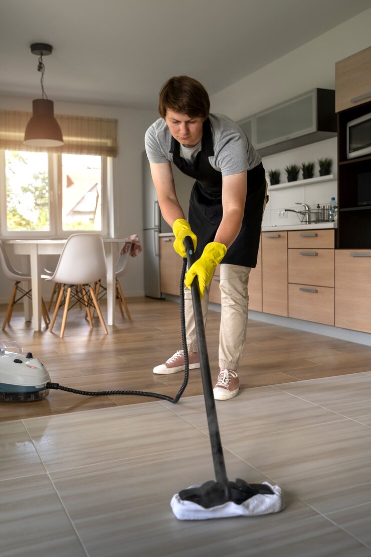 man-servant-cleaning-house_23-2149587680