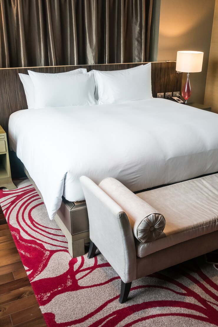 tidy-room-with-comfortable-bed_1203-1478